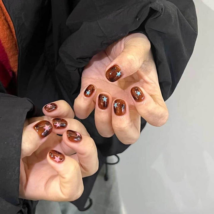 Artistic Star Motif Nail Art