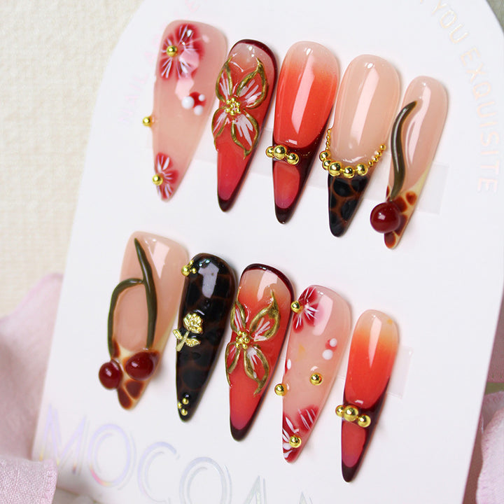 Artificial nail set with elegant floral decorations and modern accents Kalsten