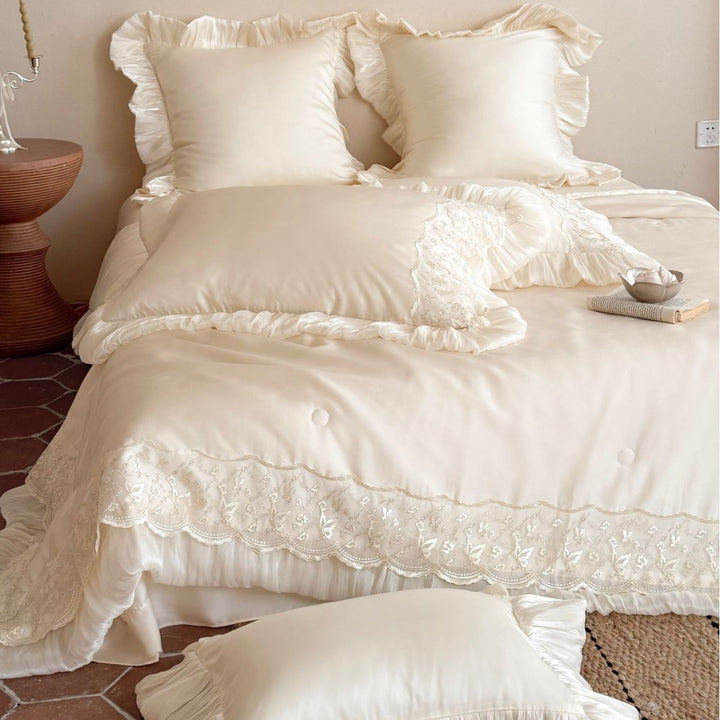 Luxurious satin bedding set with lace and ruffle decoration