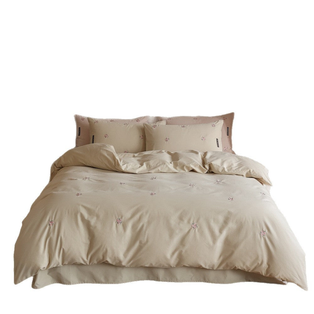 Embroidered cotton satin bedding set with subtle floral embroidery