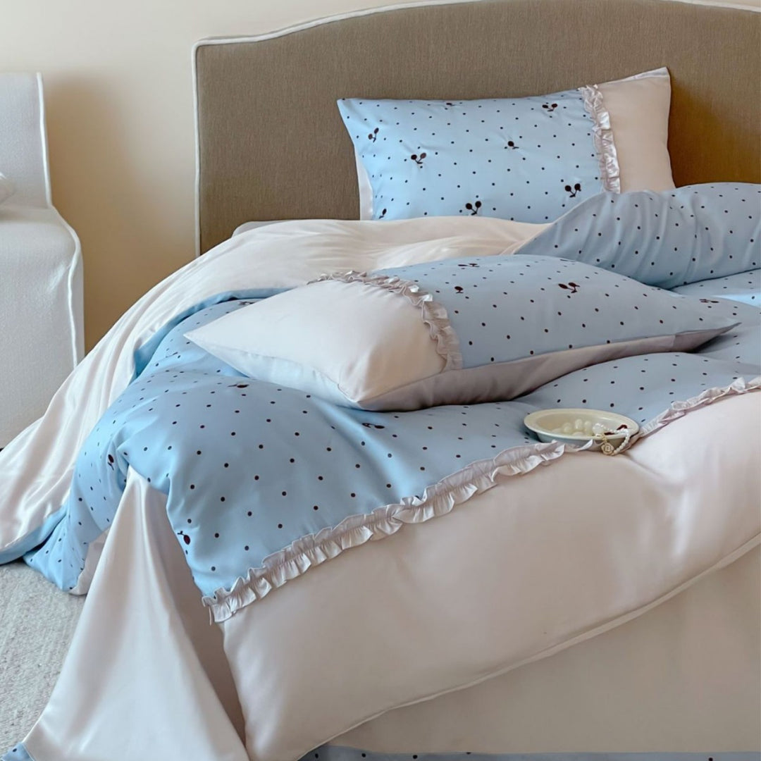 Satin bedding set with delicate ruffles and cherry pattern