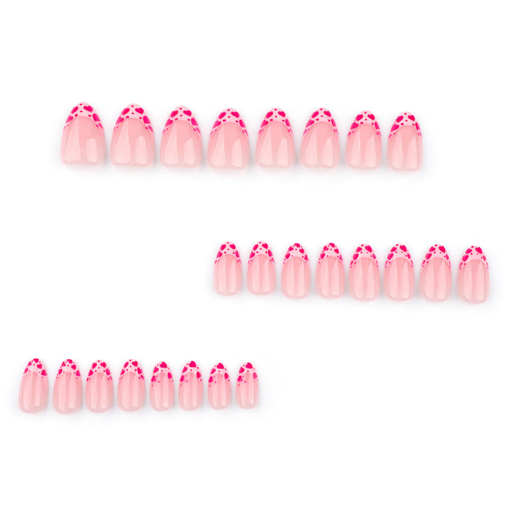Artificial nail extensions with heart tip accents Kalsten