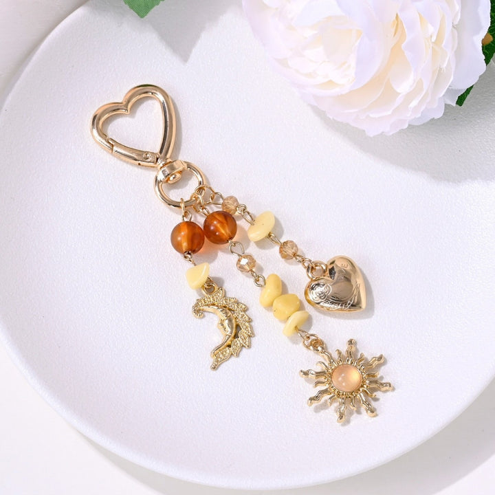 Keychain with Sparkling Sun Motif Kalsten