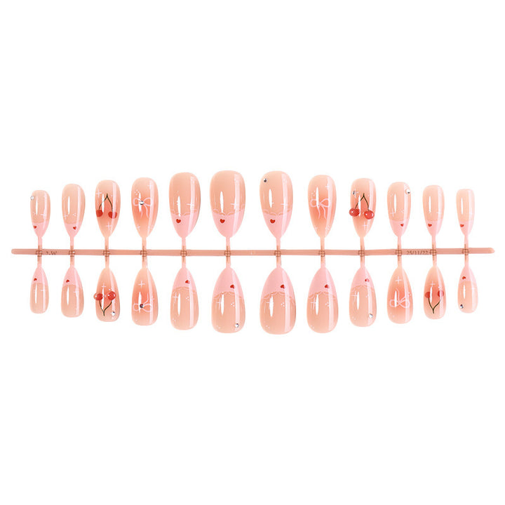 Artificial nail set with creative flower and heart designs Kalsten