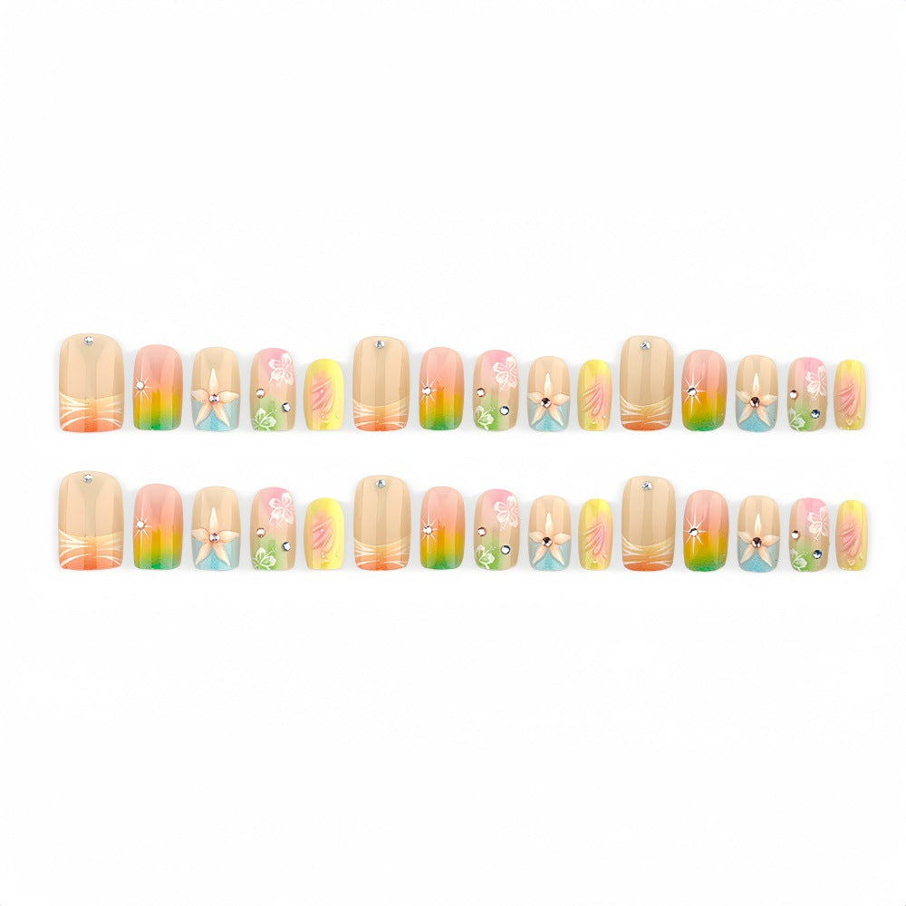 Artificial nails in vibrant floral design with glitter accents Kalsten
