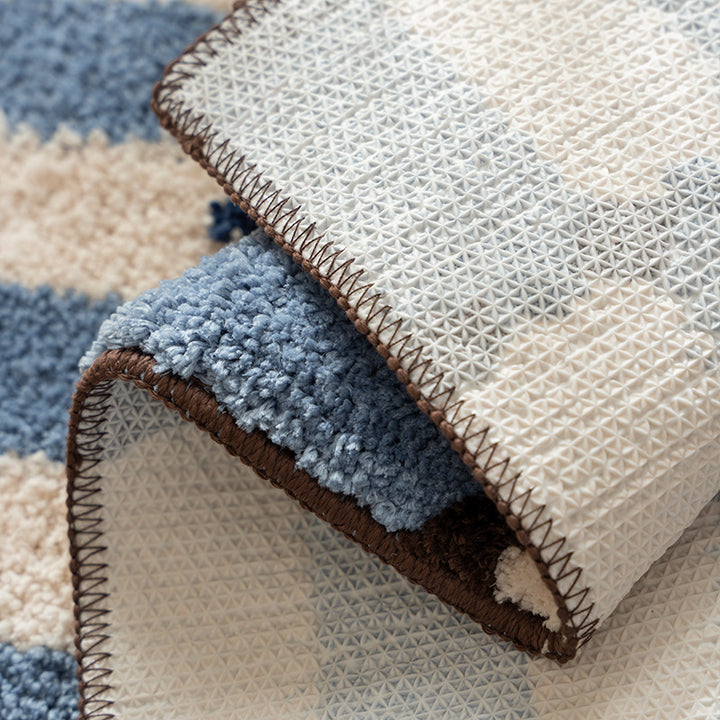 Square high-pile bath mat with textured block stripe look and contrasting edging