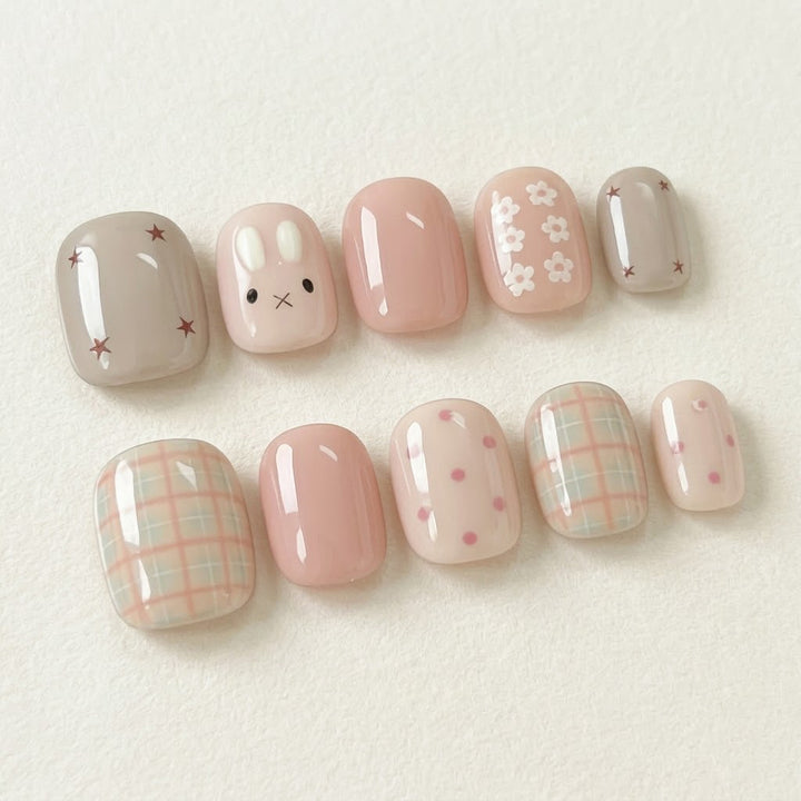 Artistic Press-On Nail Set with Floral and Geometric Designs