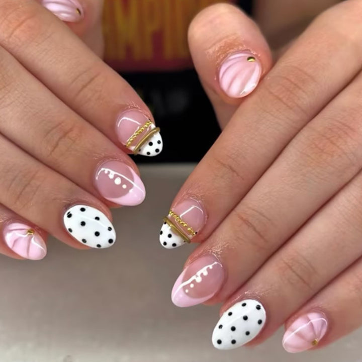 Acrylic nail set with elegant polka dot and glamorous golden accents Kalsten