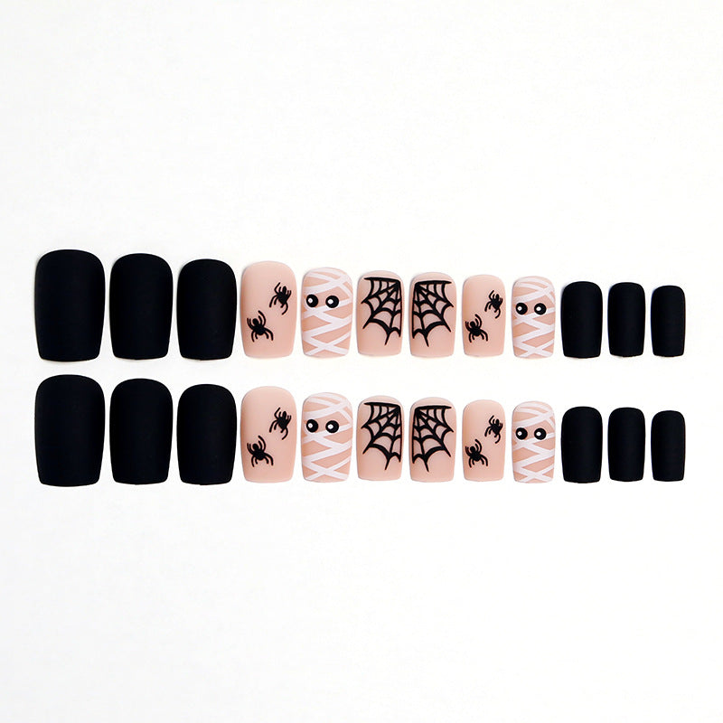 Artificial nail set with creepy Halloween motif and delicate spider designs Kalsten