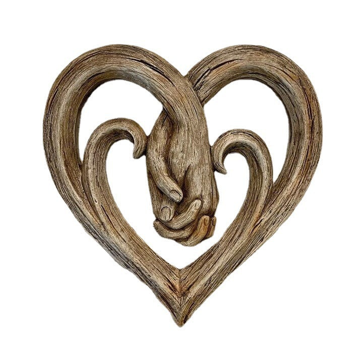 Heart-Shaped Holding Hands Sculpture