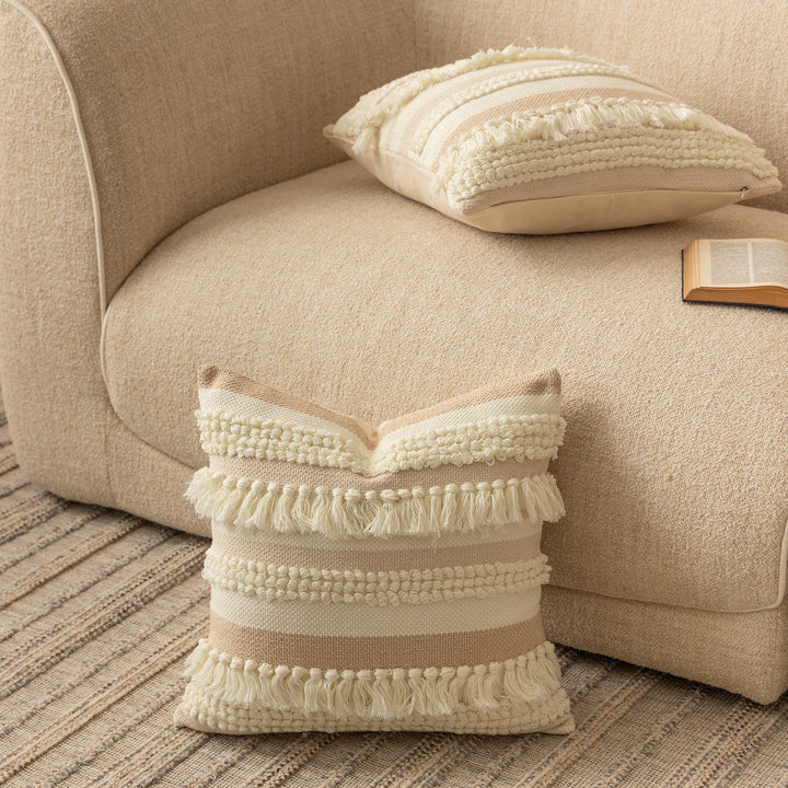 Handwoven Boho decorative pillow with tiered fringe stripes and boucle appliqués
