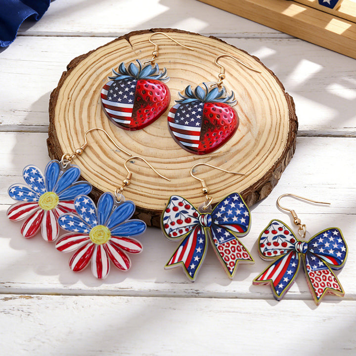 Women's eye-catching statement earrings made of acrylic with patriotic bow pendant Kalsten