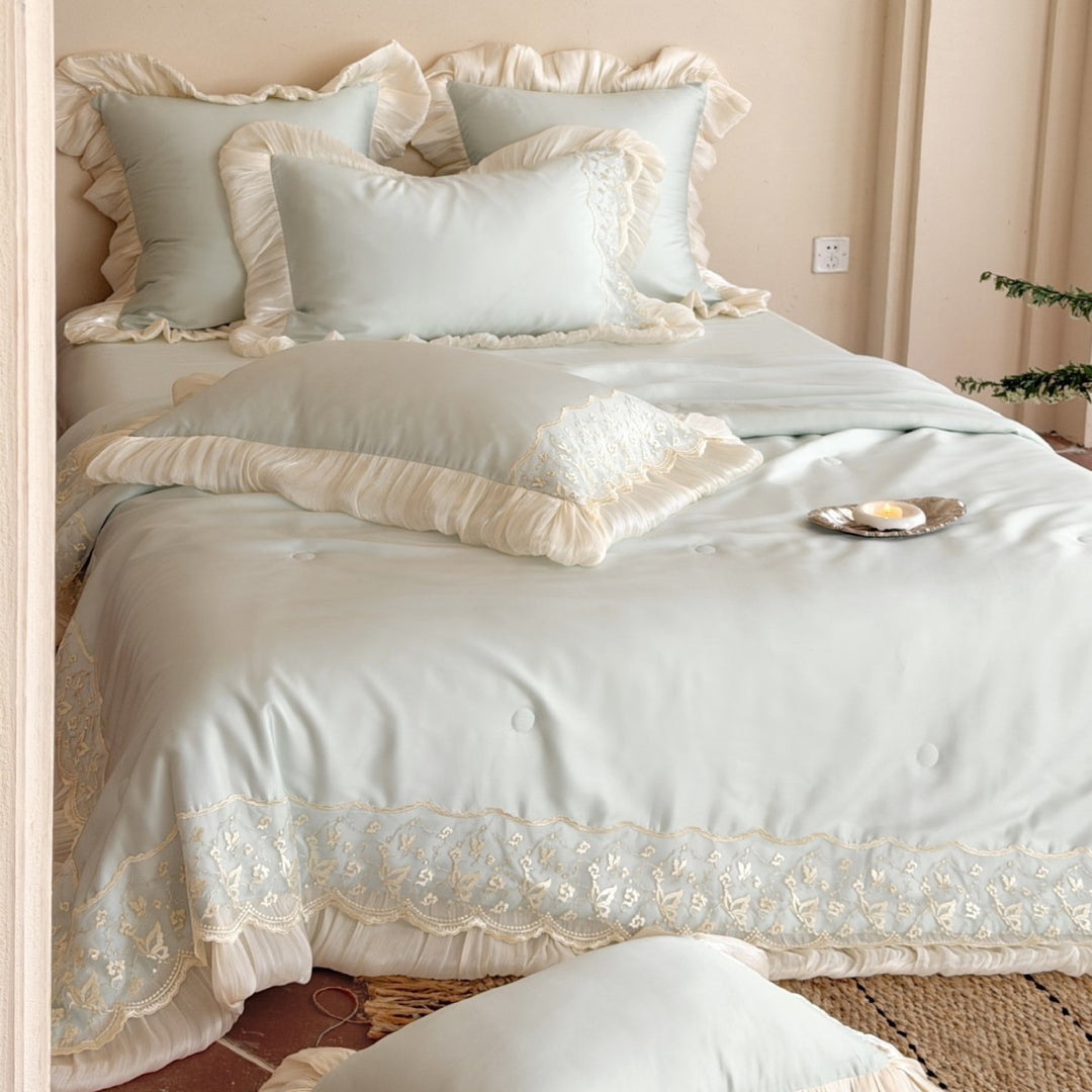Luxurious satin bedding set with lace and ruffle decoration