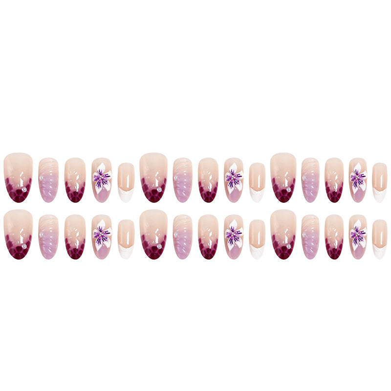 Artificial nail set with elegant ombre design and floral accents Kalsten