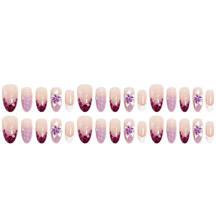 Artificial nail set with elegant ombre design and floral accents Kalsten