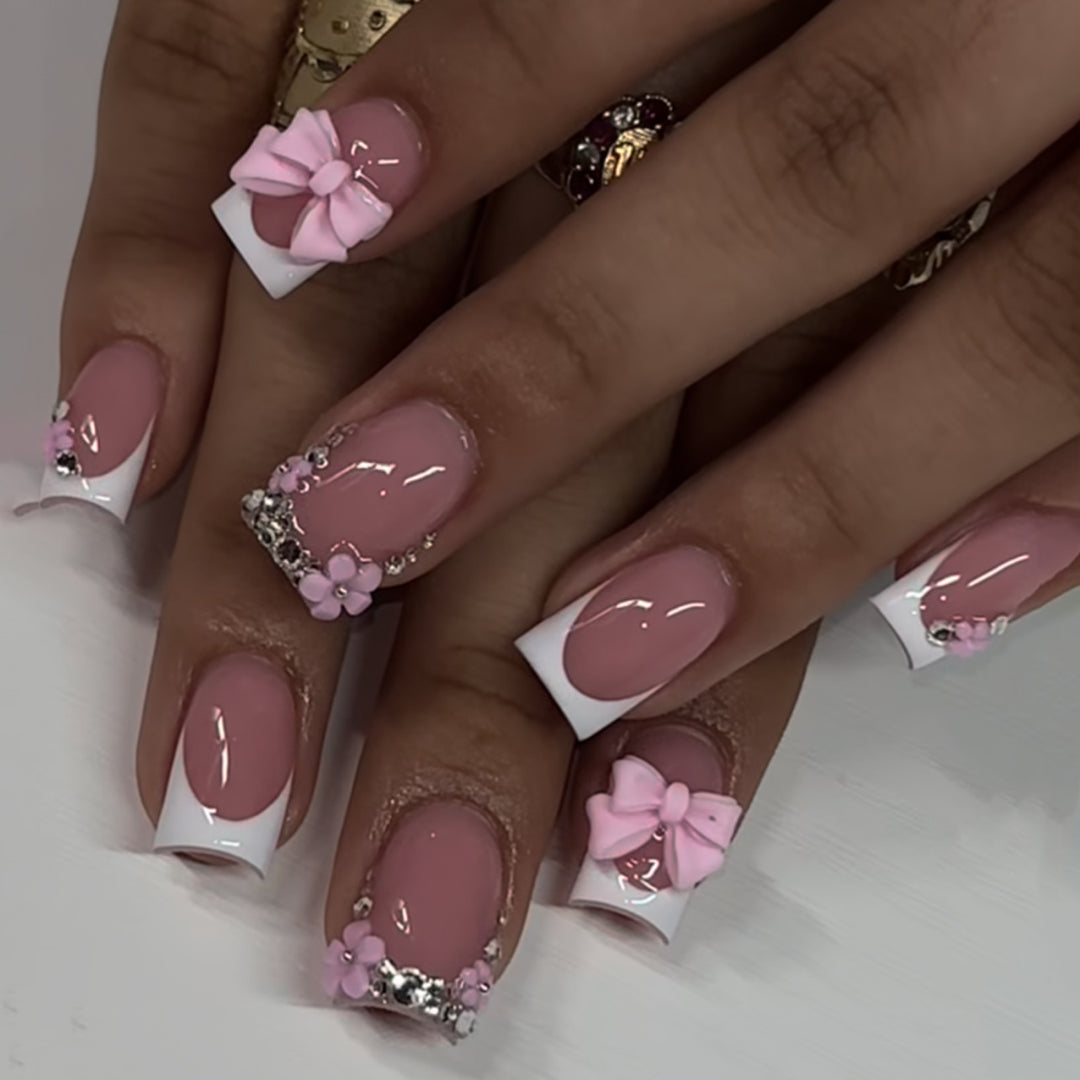 Artful Nail Art with Flower Design and Blue French Tip Kalsten