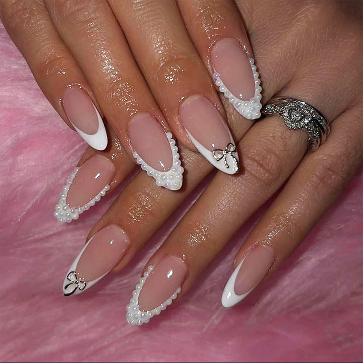Acrylic nail set with elegant blue and nude color accents Kalsten