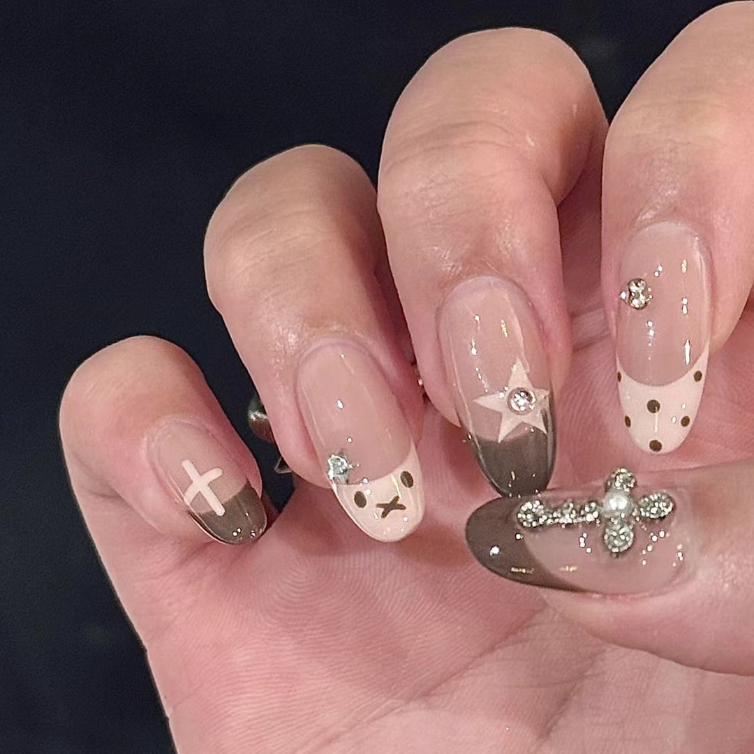 Artistic Press-On Nail Design with Decorative Accents Kalsten