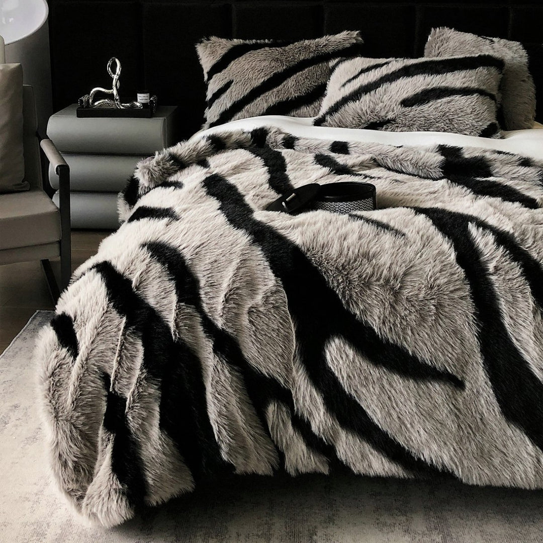 Faux fur bedspread with zebra design and extra fluffy texture