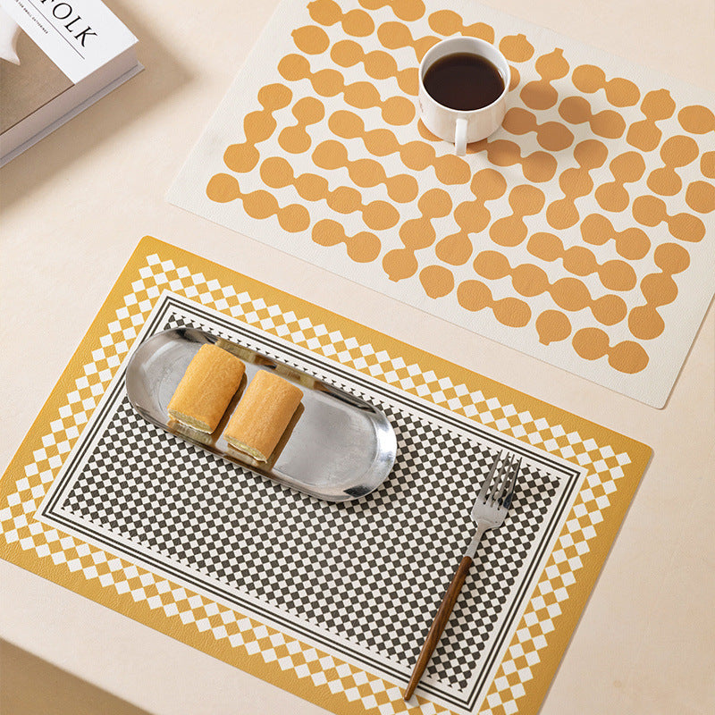Round wipeable table mat made of PVC with non-slip back and retro geometric pattern