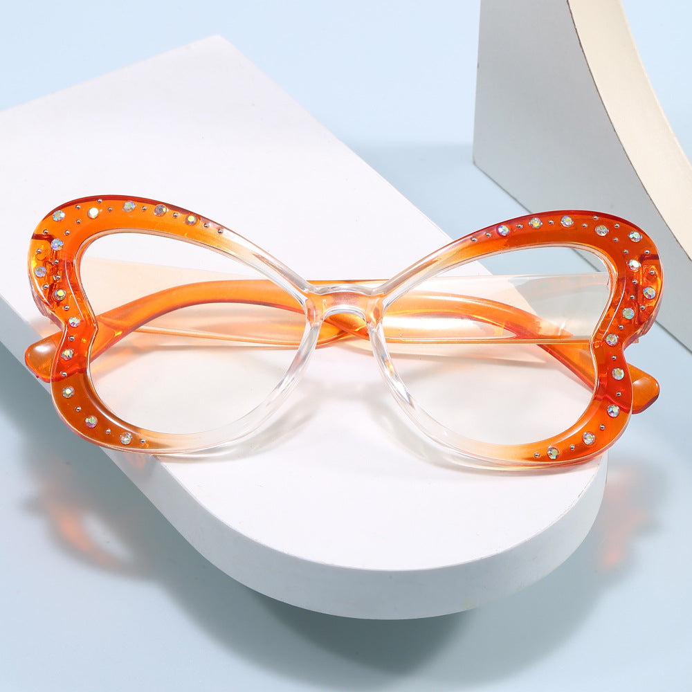 Women's playful heart-shaped sunglasses with glitter accents Kalsten