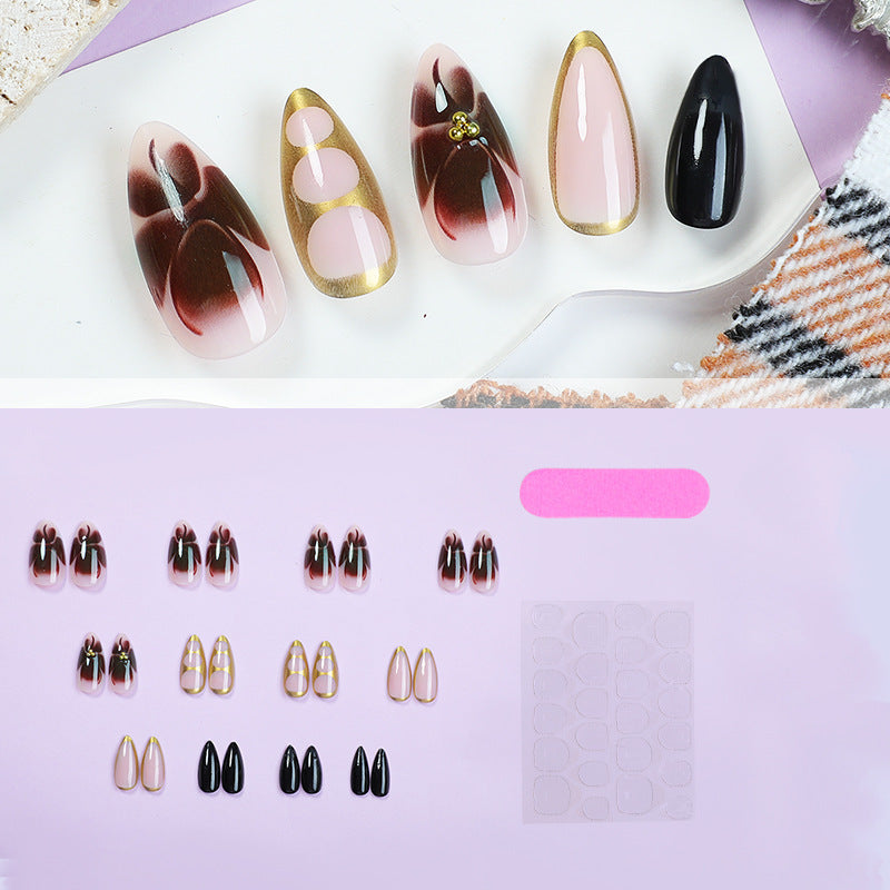 Acrylic nail set with elegant floral accents and luxurious details Kalsten