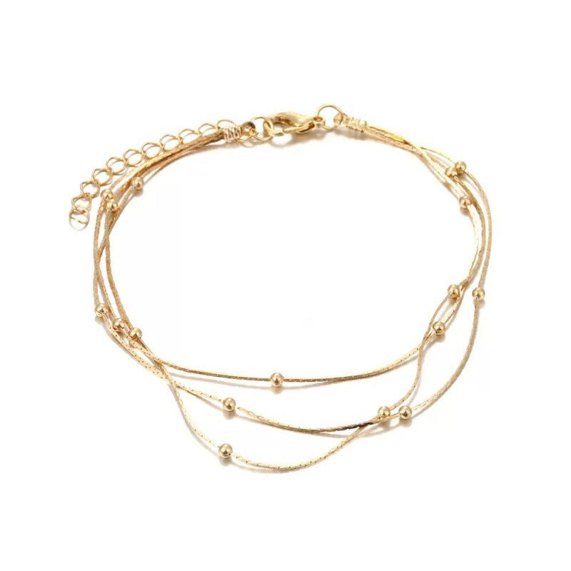 Multi-Strand Silver Beaded Bracelet Kalsten