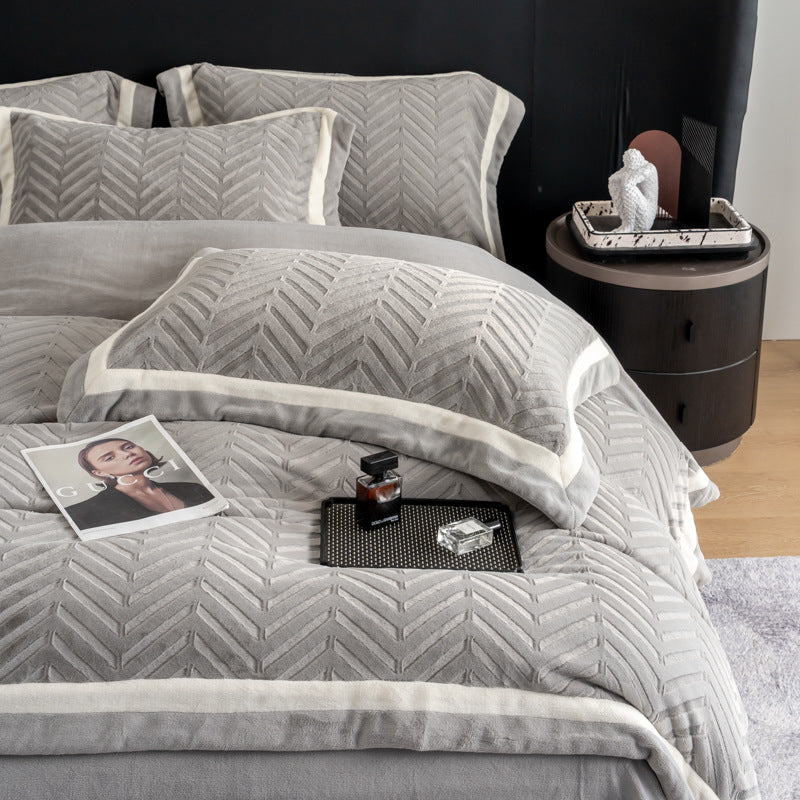 Padded velvet-look bedding set with chevron relief and piping edge