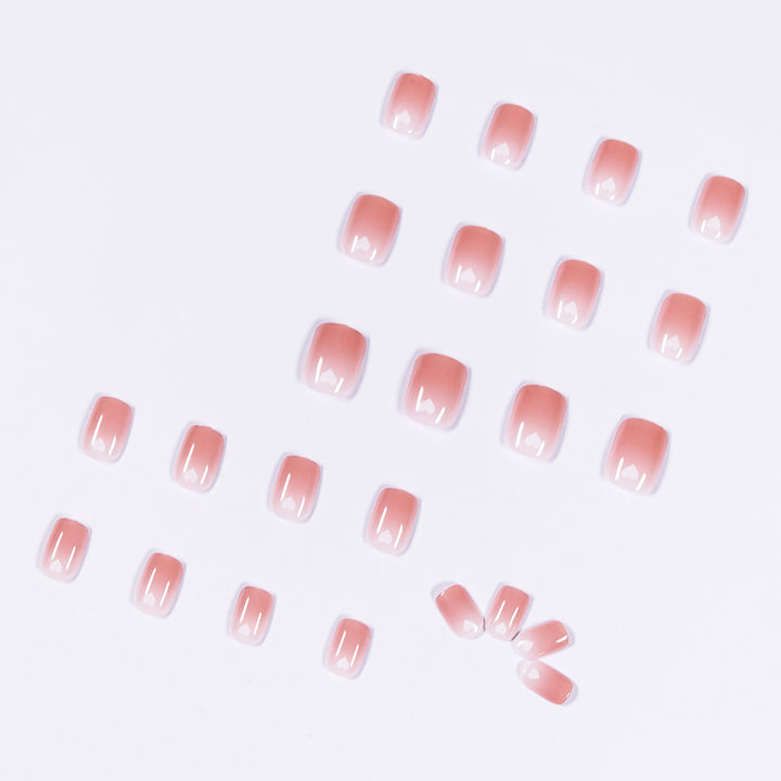 Artful nail art with heart-shaped accents and gentle ombre effect Kalsten