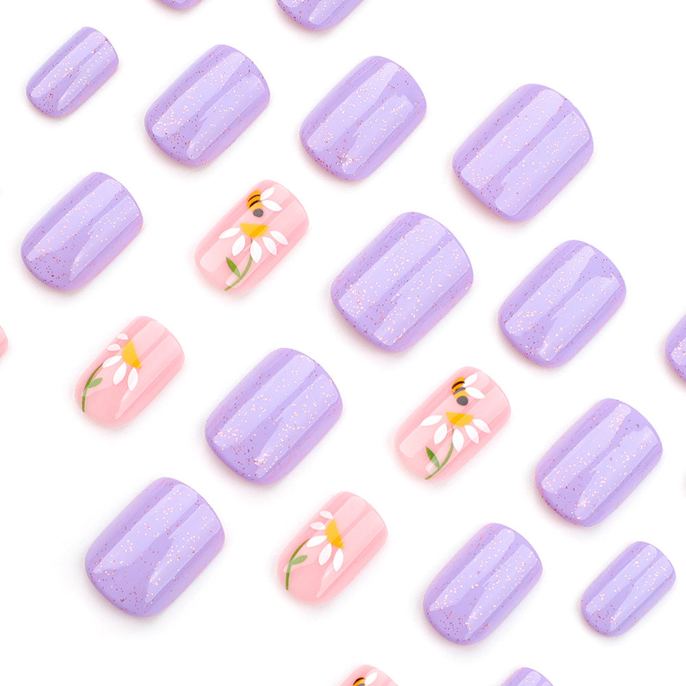Artfully designed nail extensions with flower design Kalsten