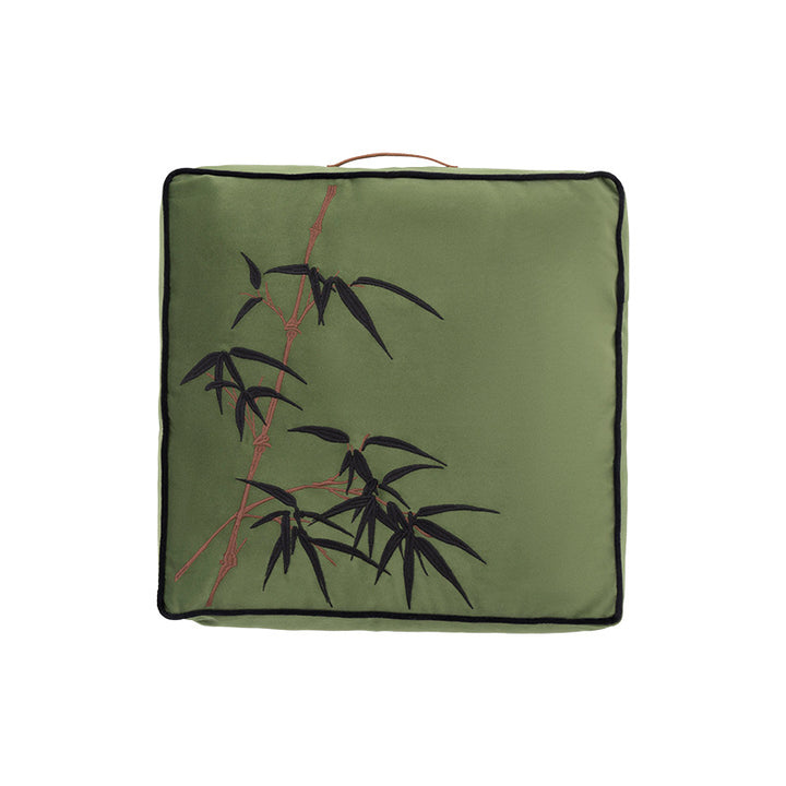 Extra-thick chair cushion with embroidered bamboo design and removable cover