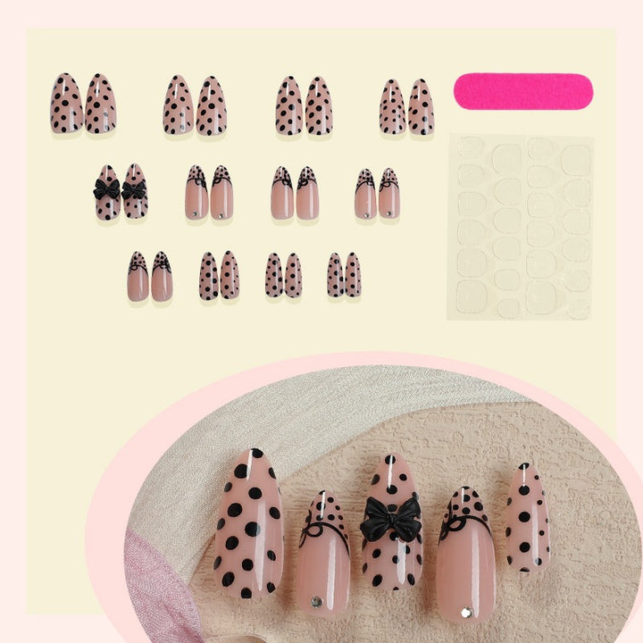 Nail art set with elegant polka dot and bow motifs Kalsten