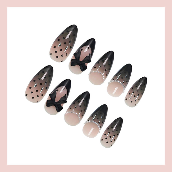 Nail art set with elegant dot and bow pattern Kalsten