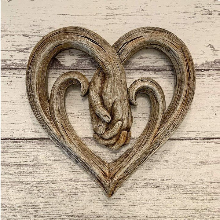 Heart-Shaped Holding Hands Sculpture