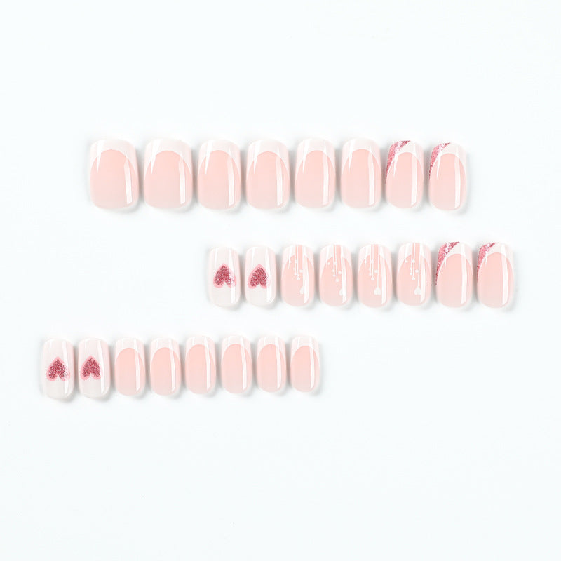 Artful nail designs with heart and glitter accents Kalsten