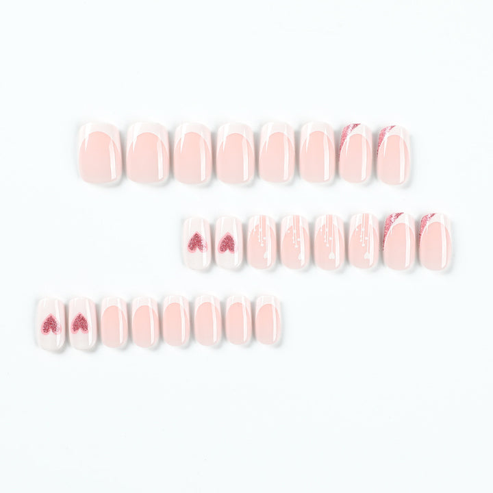 Artful nail designs with heart and glitter accents Kalsten