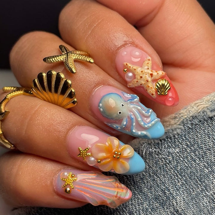 Creative nail art set with maritime designs and elegant embellishments Kalsten
