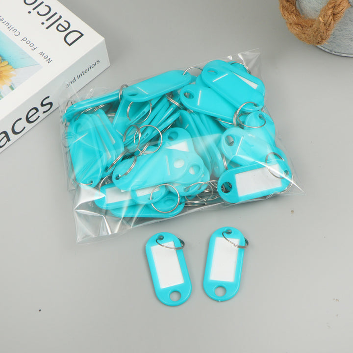 Unisex writable keychain with clear labeling field Kalsten