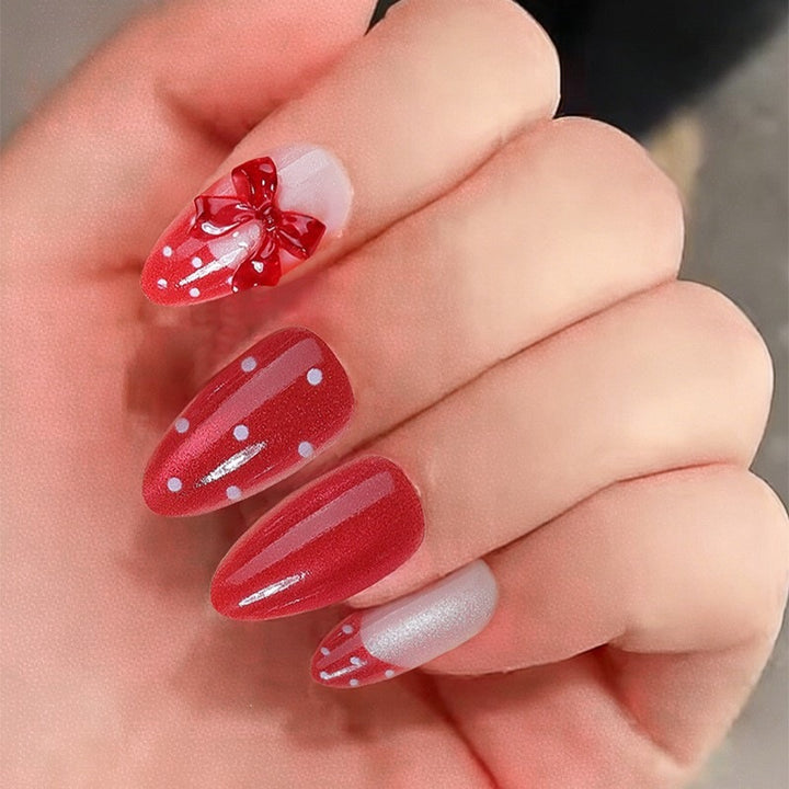 Nail art set with playful bow design and polka dot pattern Kalsten