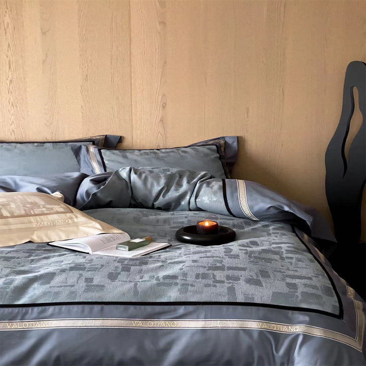 Premium bed set made of heavy cotton satin with woven mosaic relief and double stitched hem