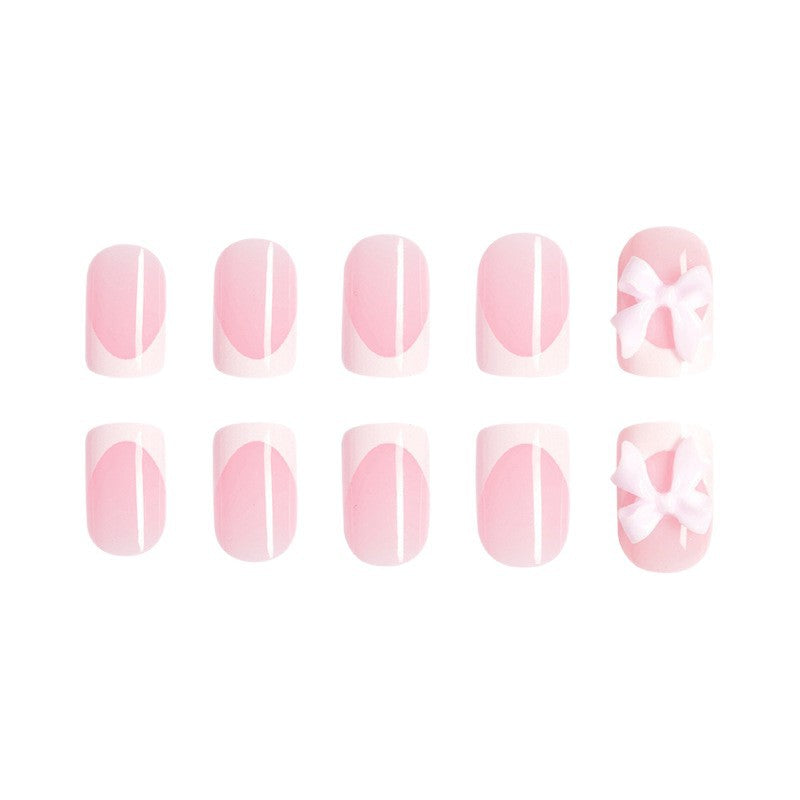 Acrylic nail set with playful bow design Kalsten