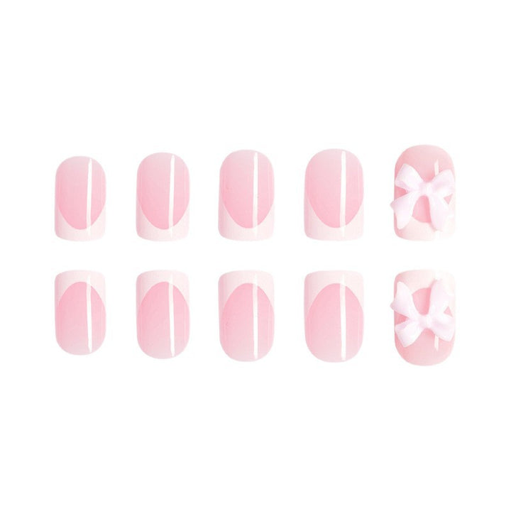 Acrylic nail set with playful bow design Kalsten