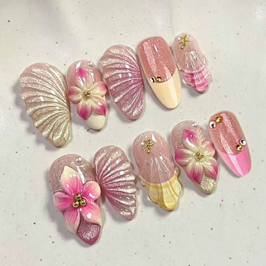 Artificial nail set with elaborate flower and shell patterns Kalsten