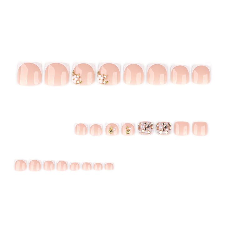 Glamorous toenail art with luxurious rhinestone and floral designs Kalsten