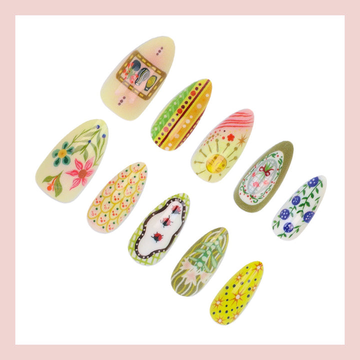 Nail art set with elaborate floral and colorful design Kalsten