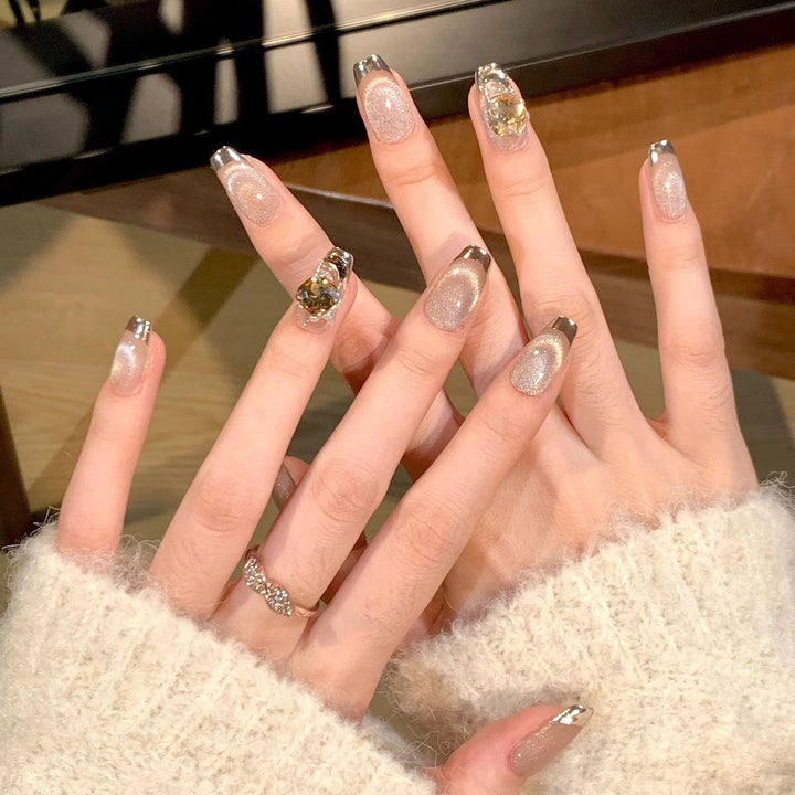 Artificial nail set with glamorous gold and glitter accents Kalsten