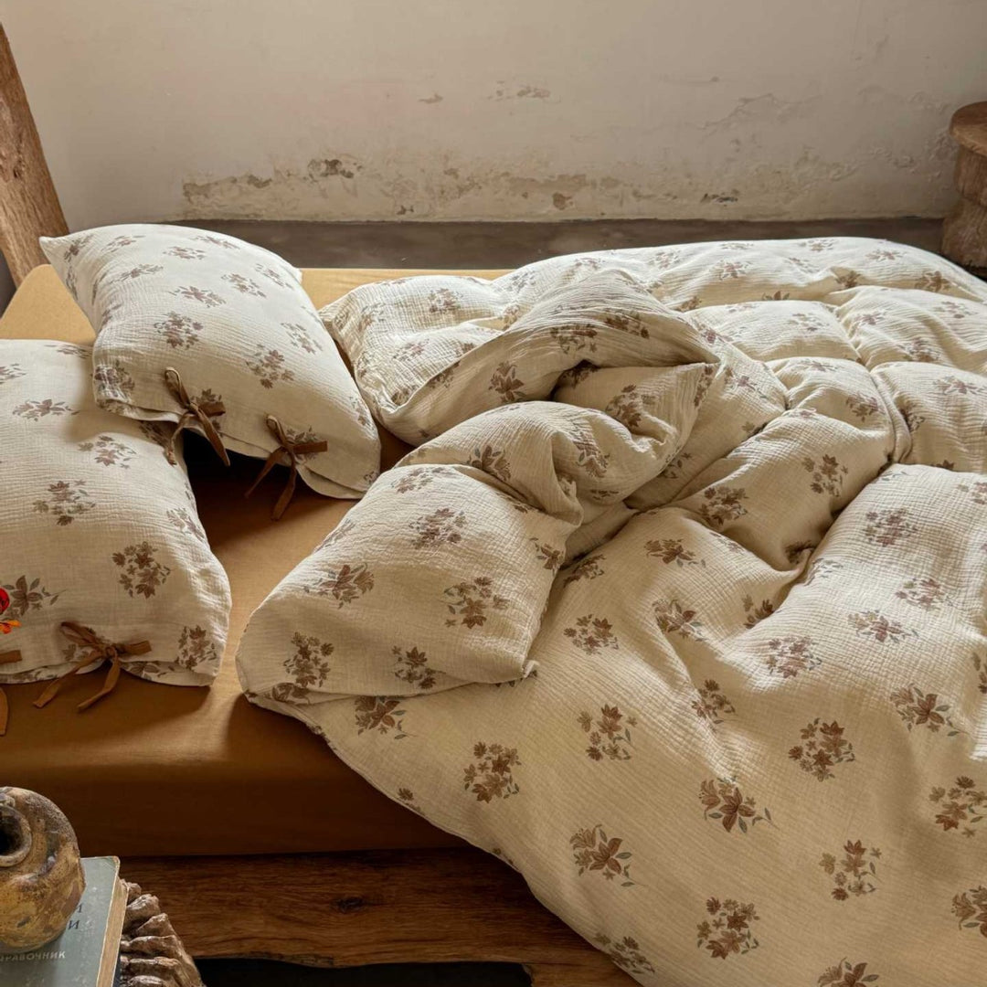 Natural cotton-linen duvet cover set with a crinkled linen look and floral tone-on-tone pattern