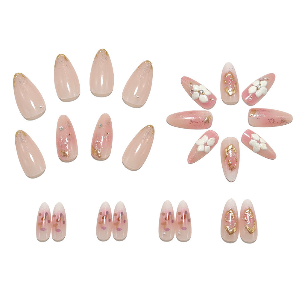 Art nail design with floral accents and glitter tips Kalsten