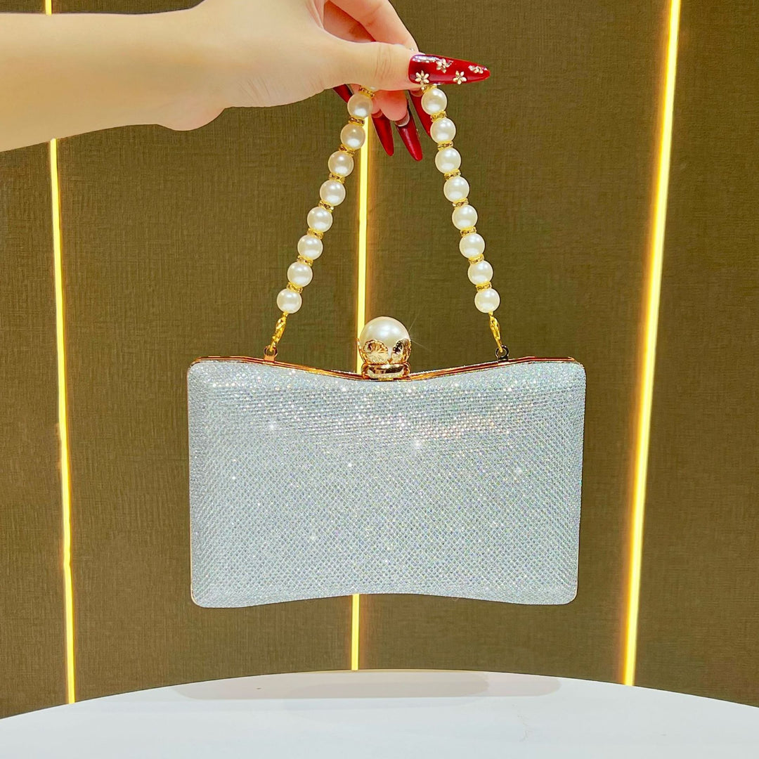 rhinestone-embellished evening clutch