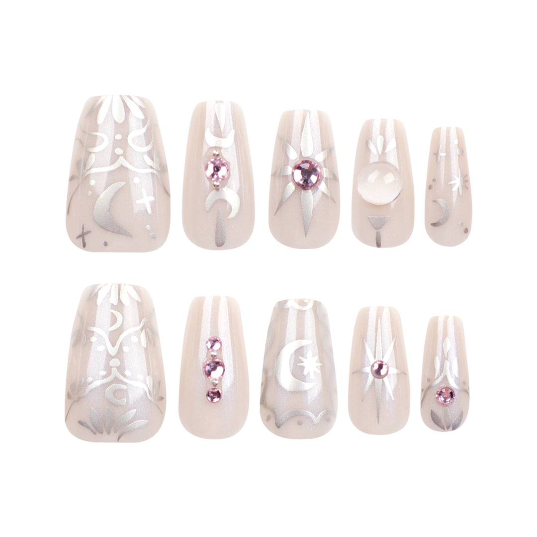 Artificial nail art with elegant rhinestone and glitter effects Kalsten